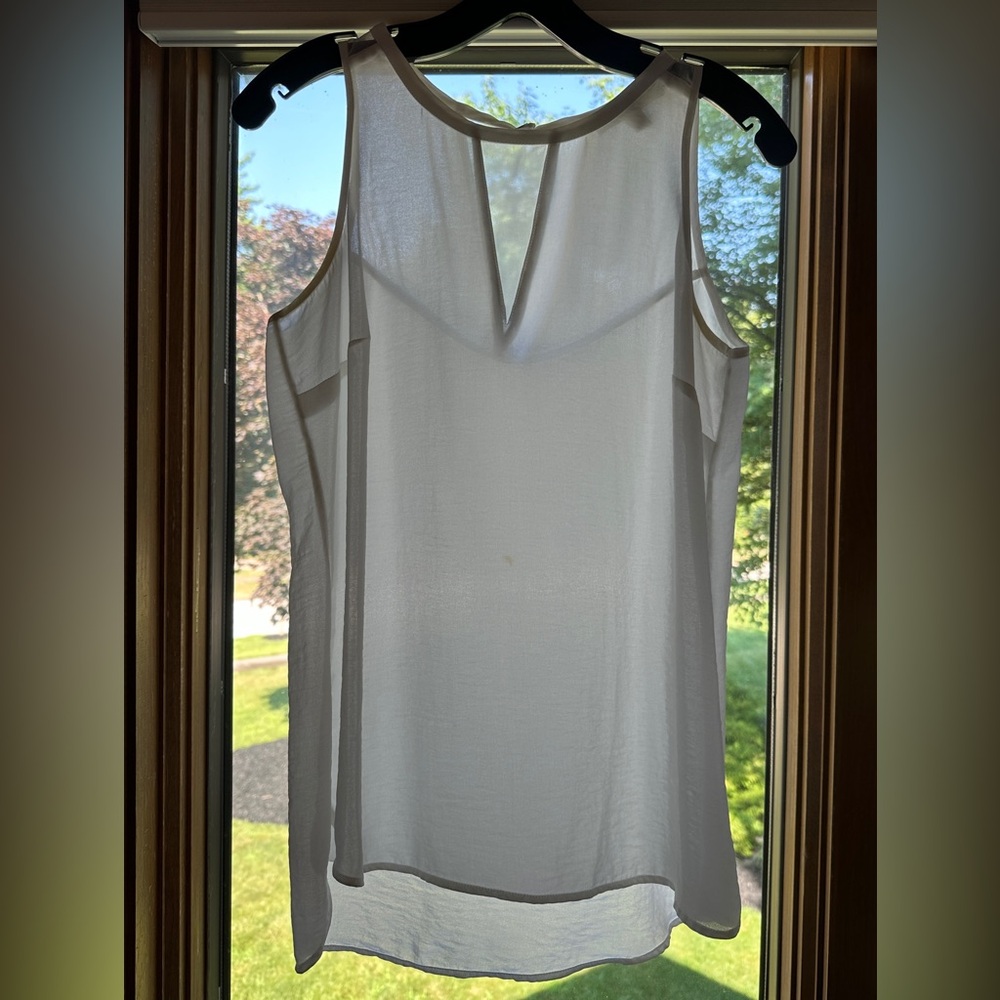 Banana Republic sheer white sleeveless top. Pretty stitching and button detail.